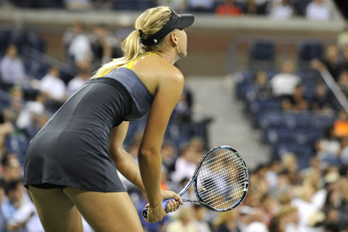 Maria Sharapova (RUS)[3] concentrates as she plays againt Anastasiya Yakimova (BLR) during a women's singles 2nd Round match on day 3 of the 2011 US Open.